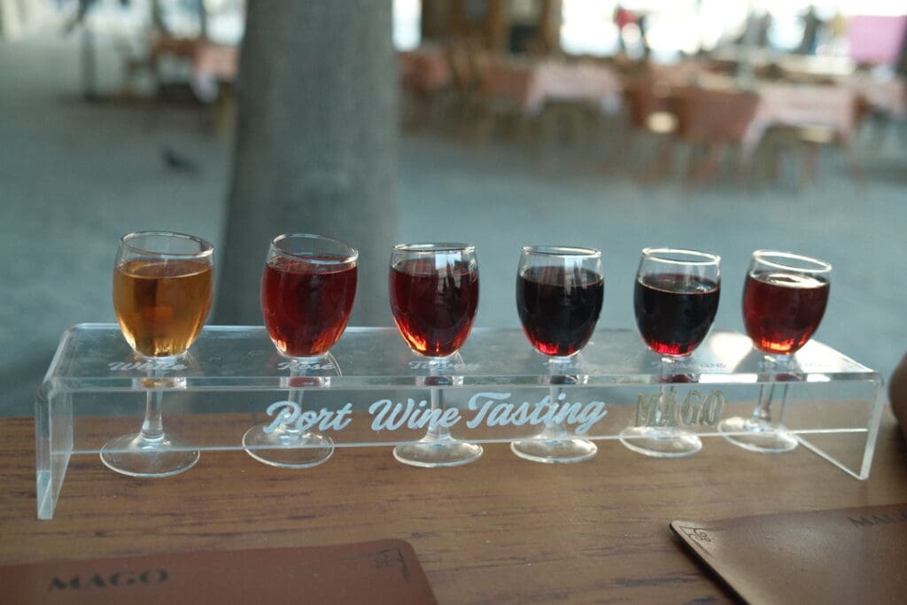 A flight of port wine during a tasting experience in Porto, Portugal.