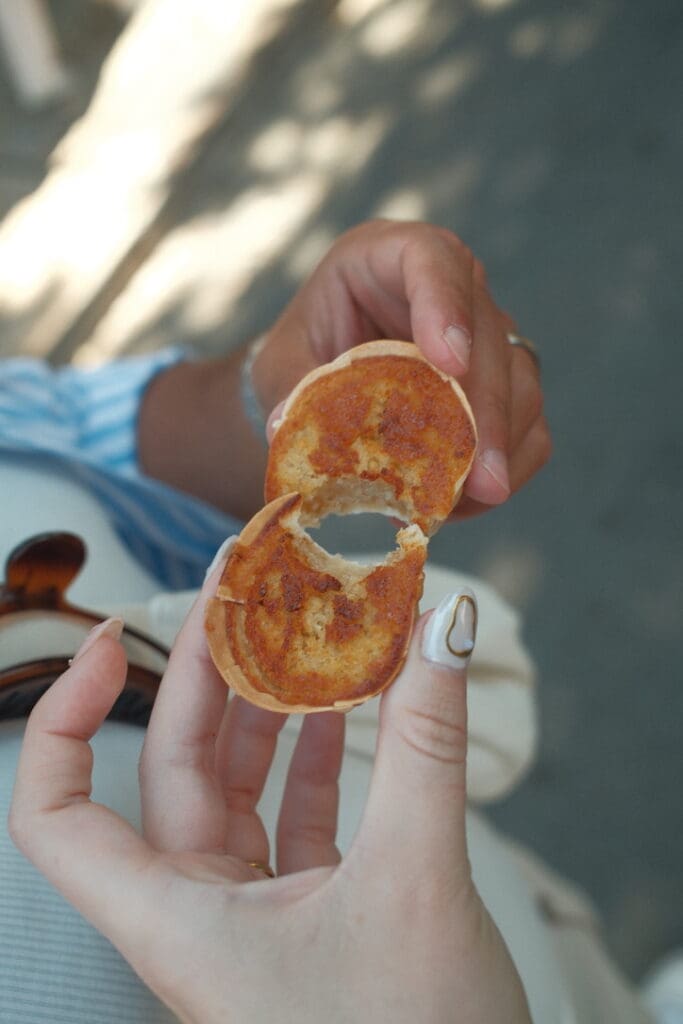 A freshly baked pastel de nata held up to the camera, showcasing Portugal's famous custard tart.
Wine in Porto