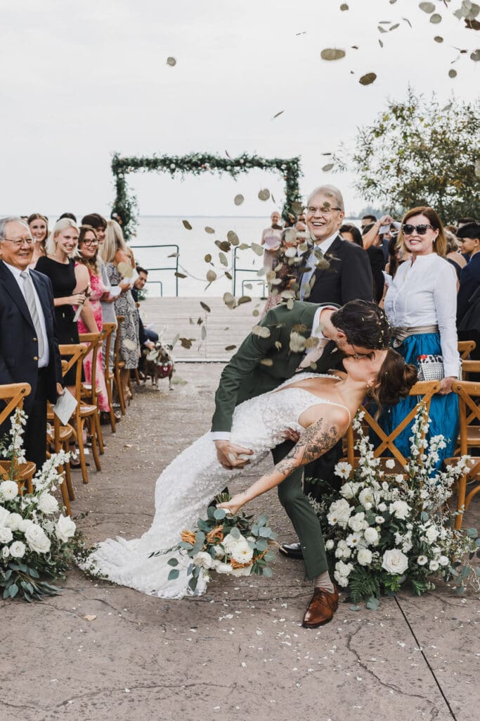 Bride and groom celebrating with guests after their wedding ceremony